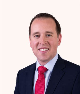 Official portrait of John Cummins