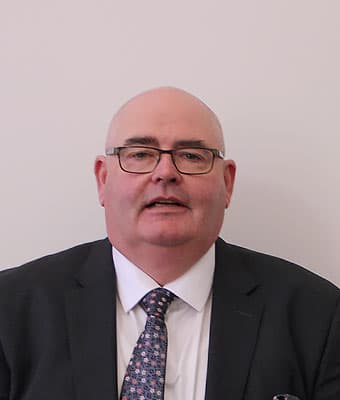 Official portrait of Manus Boyle