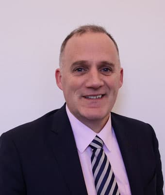 Official portrait of Naoise Ó Muirí