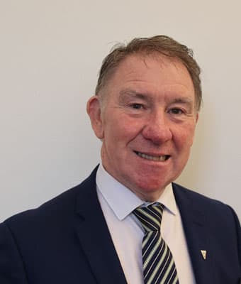 Official portrait of Peter Roche